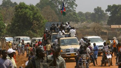 The crowds take to Yei's dusty streets to celebrate their independence.